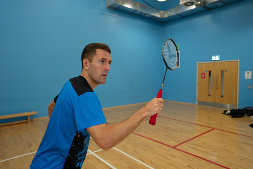 preparation for backhand drive in badminton