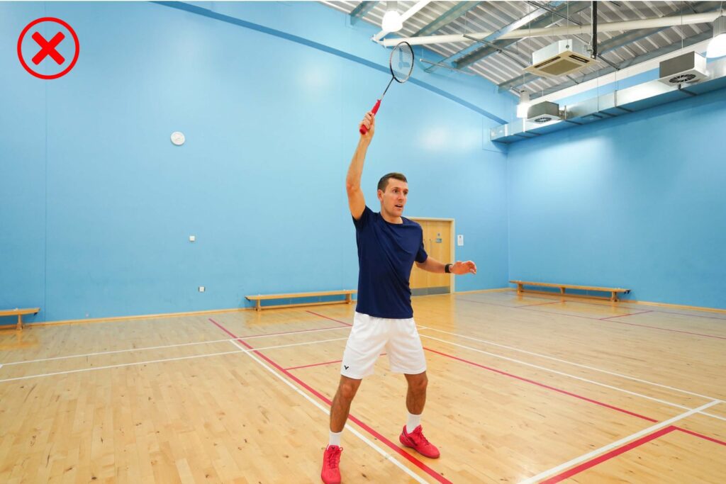 arm too straight at the net in badminton