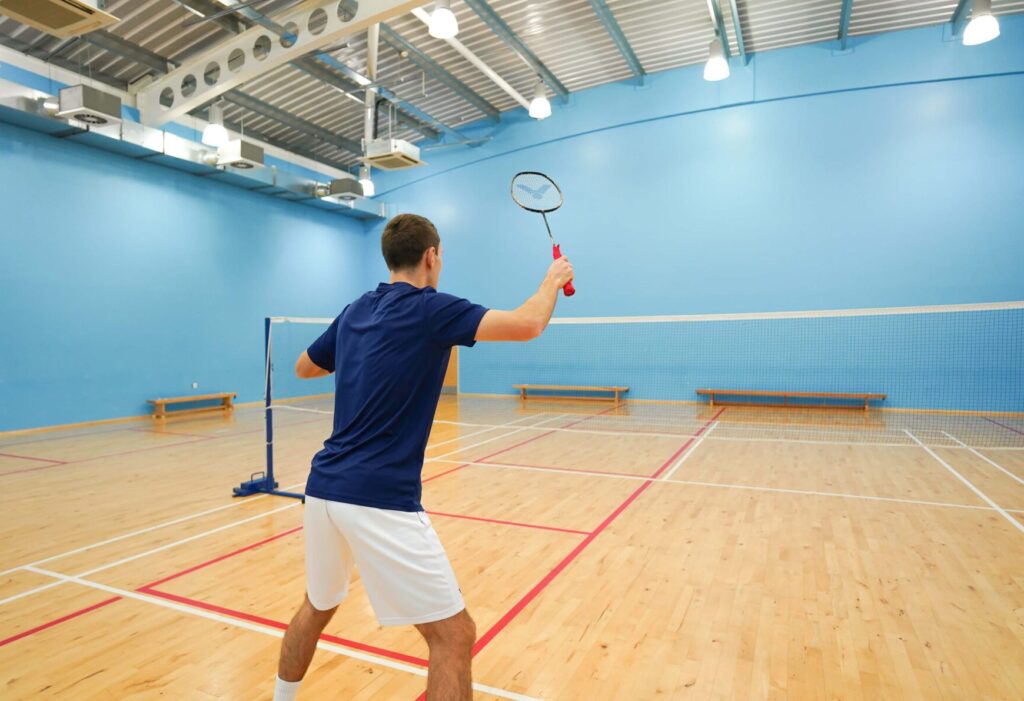 elbow out at the net in badminton