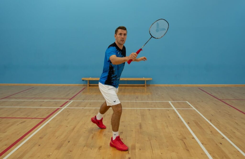 backhand drive shot in badminton