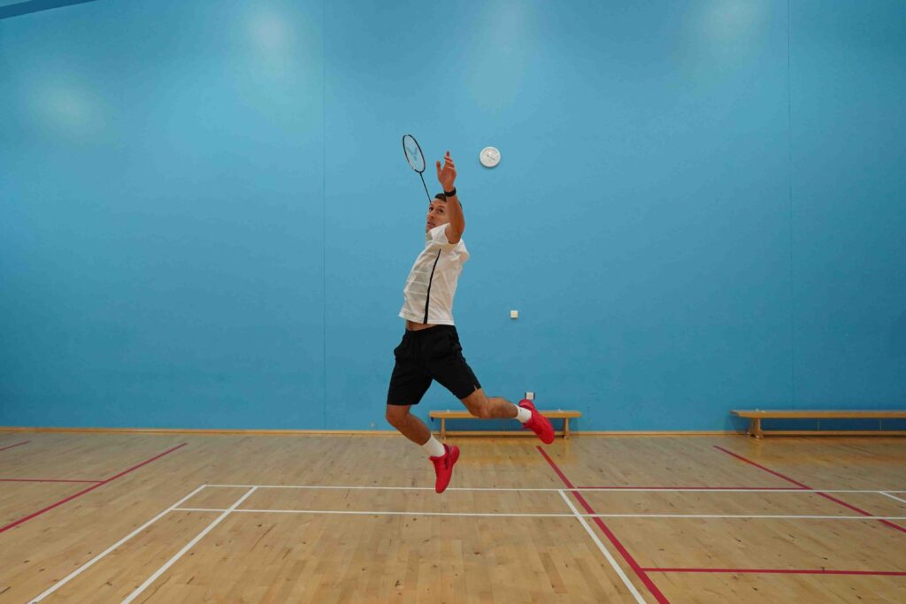Jump out smash in badminton
