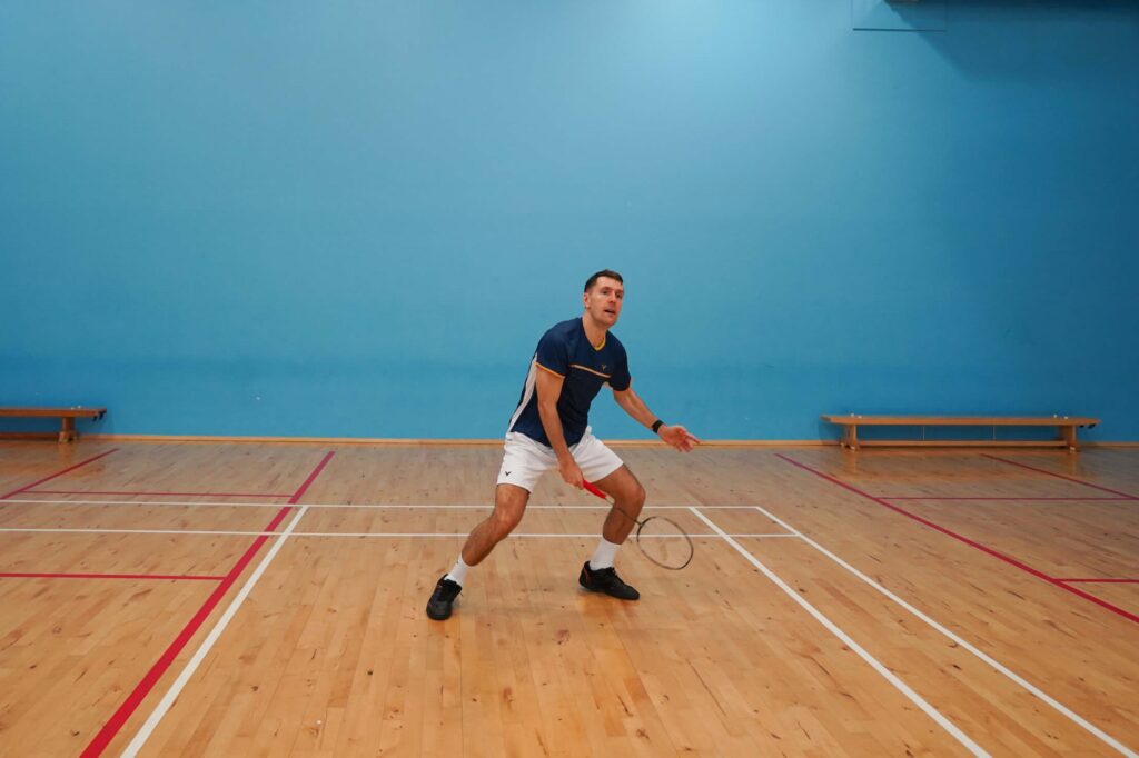 landing recovery for jump out smash in badminton