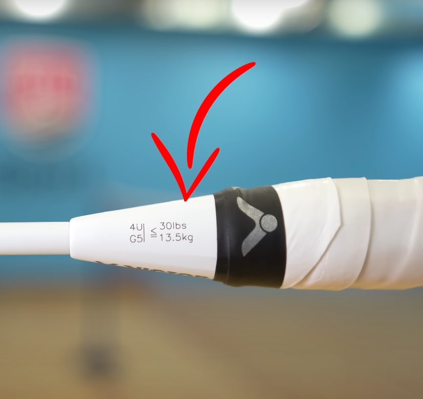 Maximum string tension shown on the cone of a badminton racket