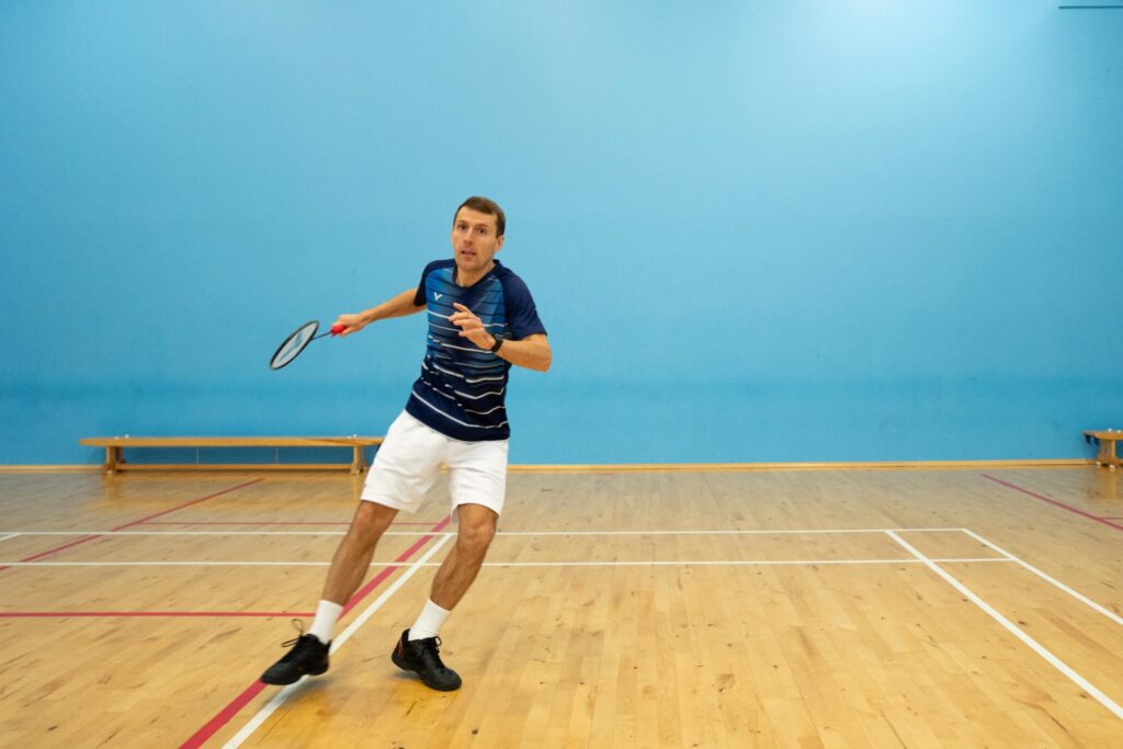 badminton pivot on non racket leg for rear court movement