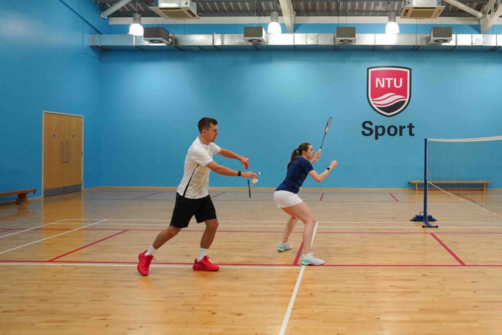 mixed doubles serving setup in badminton