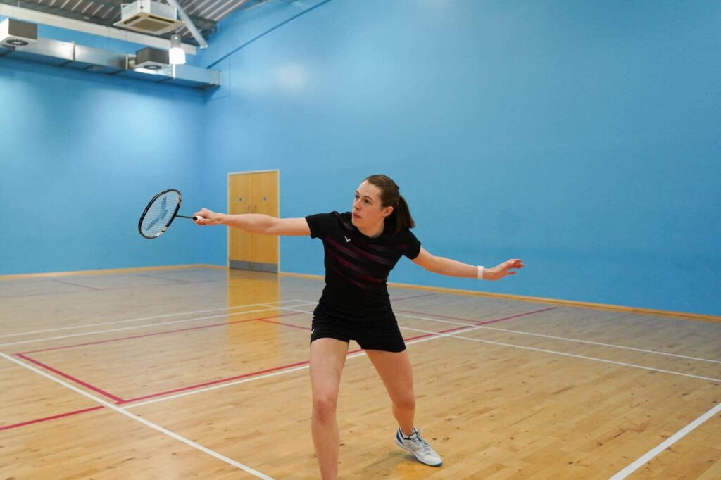 backhand lift shot in badminton