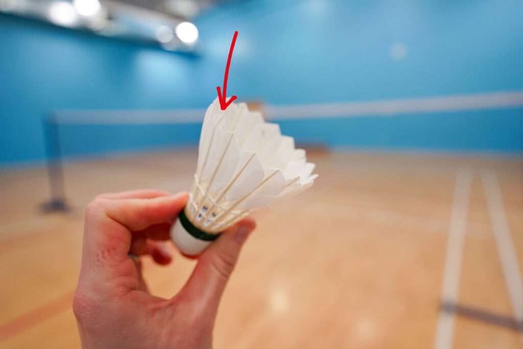 tipping badminton shuttlecock inwards to make it faster