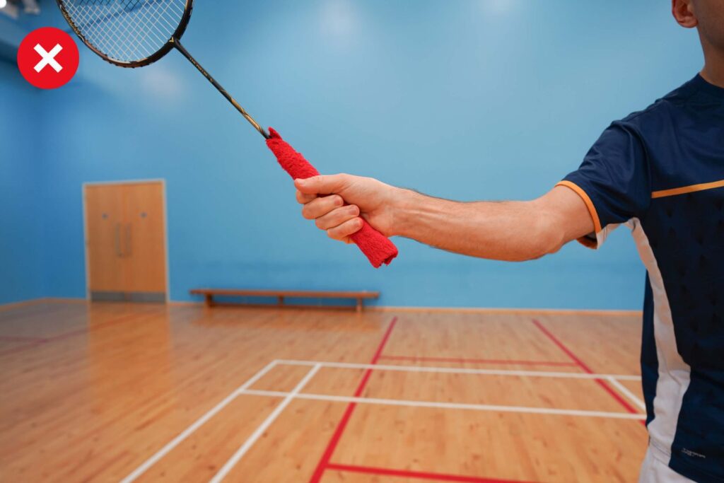 tensed grip when hitting in badminton
